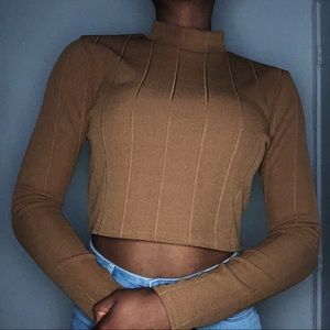 Brown cropped sweater.